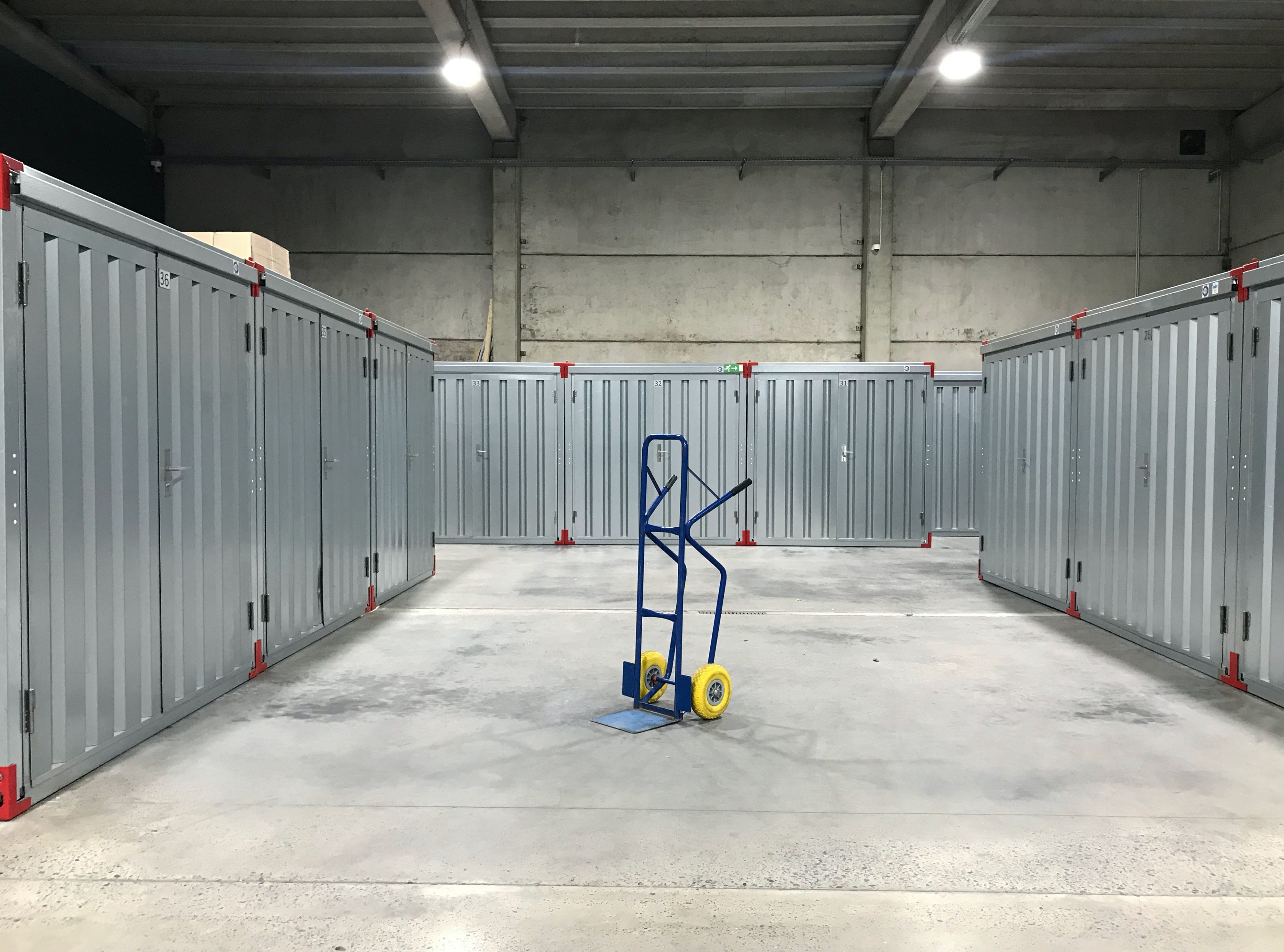 a trolley ready to get gas bottles into a storage cage