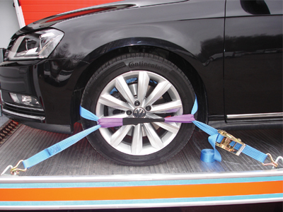 Ratchet Strap In Use Securing Car
